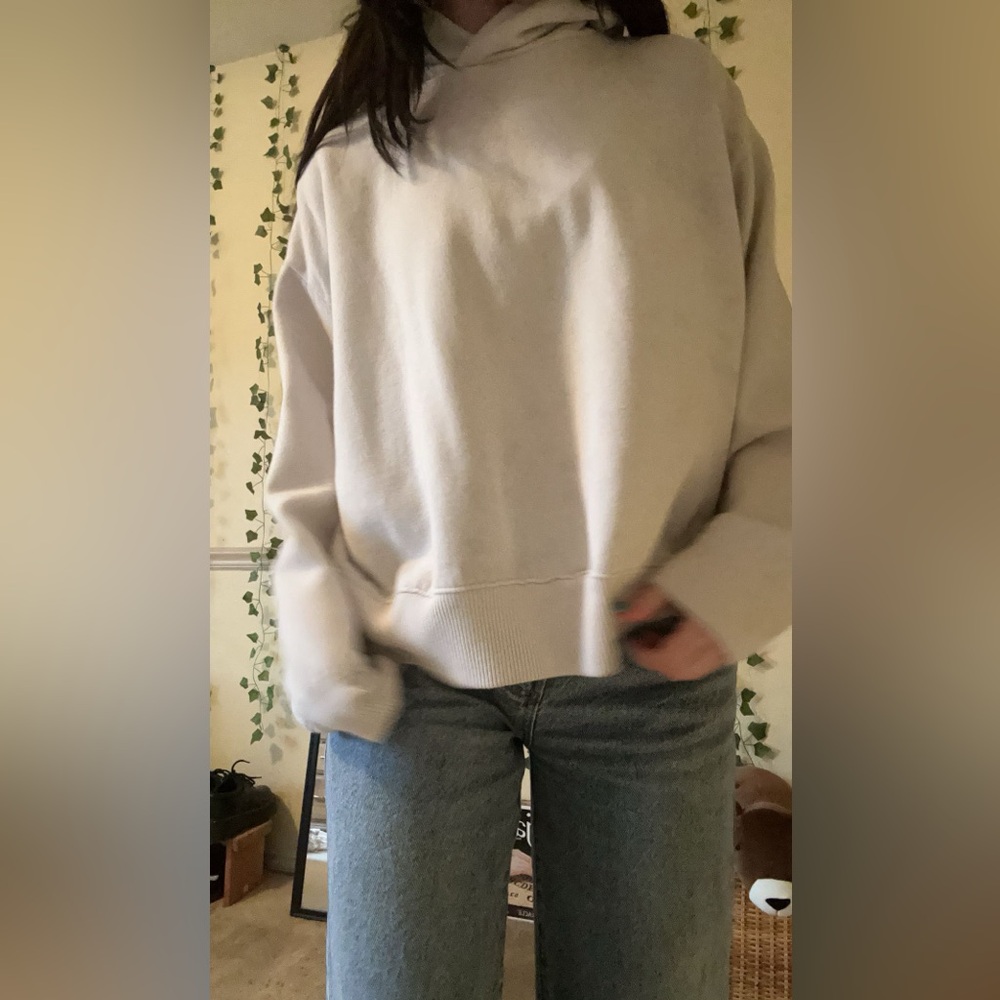 A new day cream hoodie